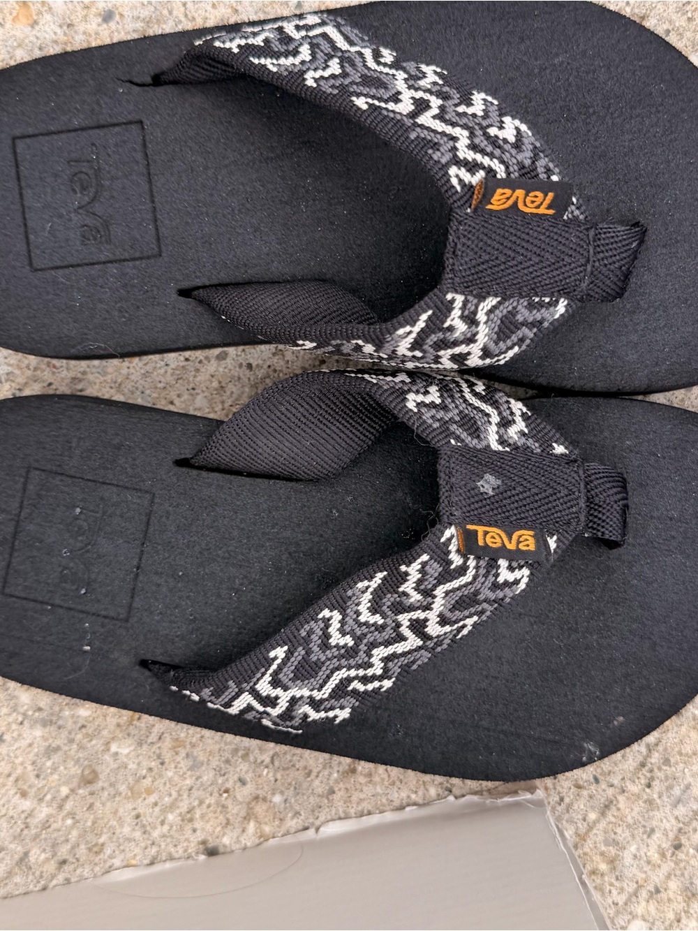 Teva Kids Black Flip Flops with White Patterned Straps